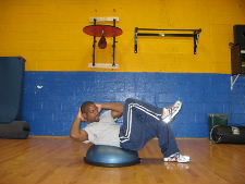 bicycle crunches on a bosu ball