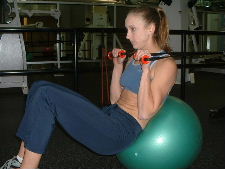 ball crunches with a cable for resistance