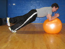 plank on a stability ball with 1 leg