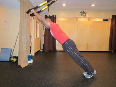 trx standing plank roll out